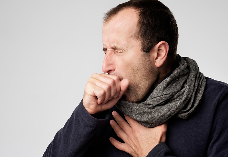 Image of a man with a cold