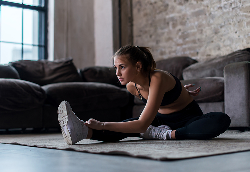 Image of a woman stretching