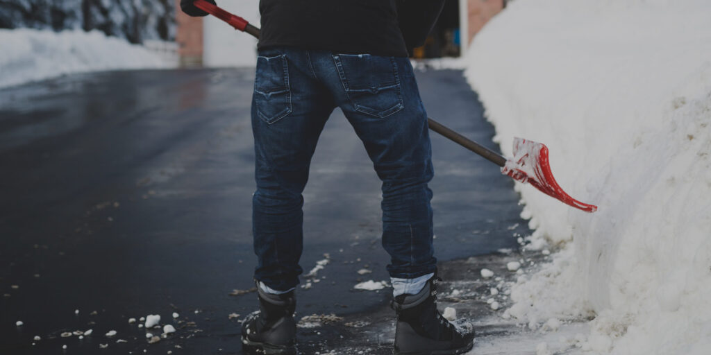 Image of a man shoveling