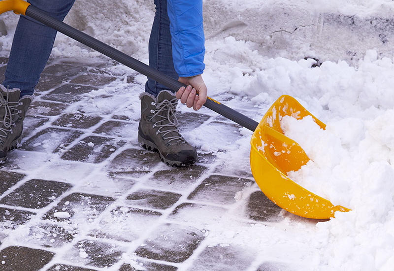 Image of a man shoveling