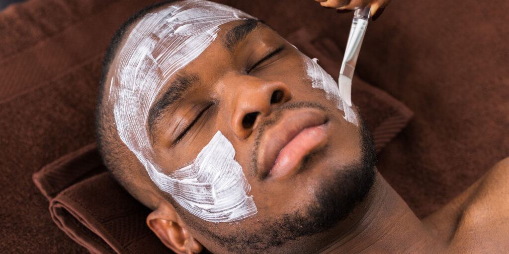 Black man getting a chemical peel