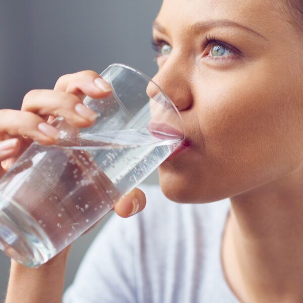image of a woman drinking water