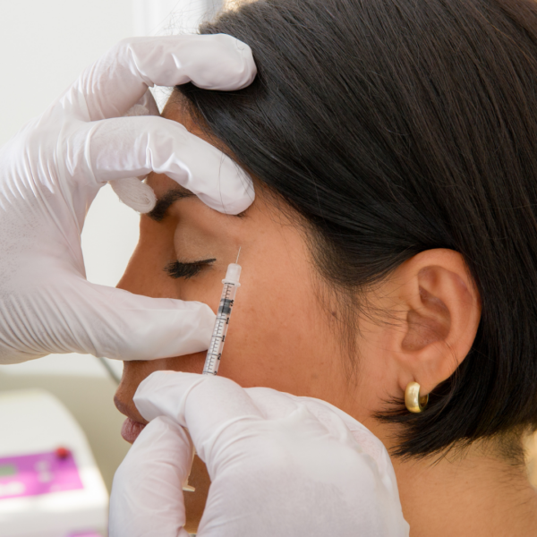 A woman getting botox for migraines