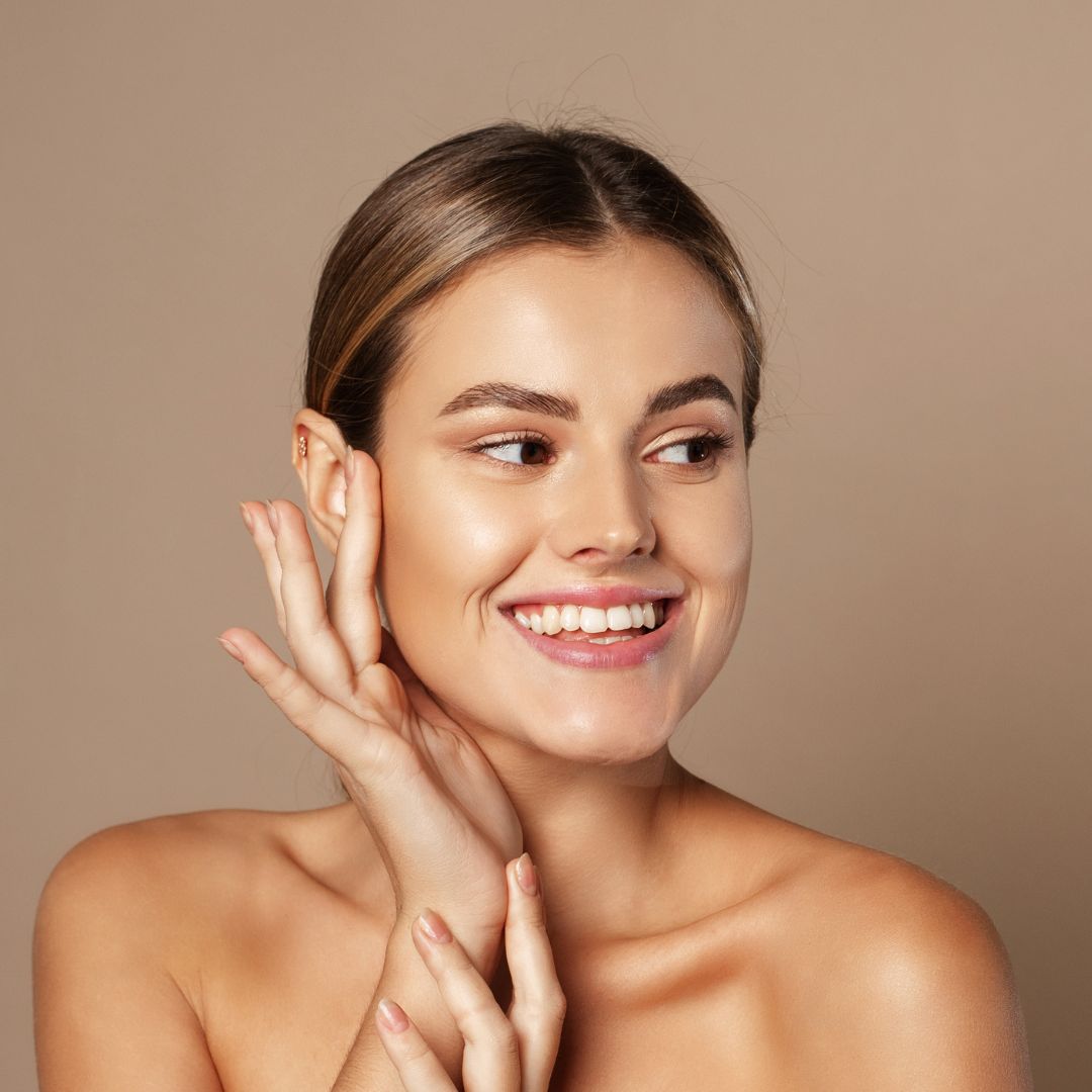 happy woman with glowing skin