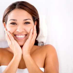 smiling woman in robe 