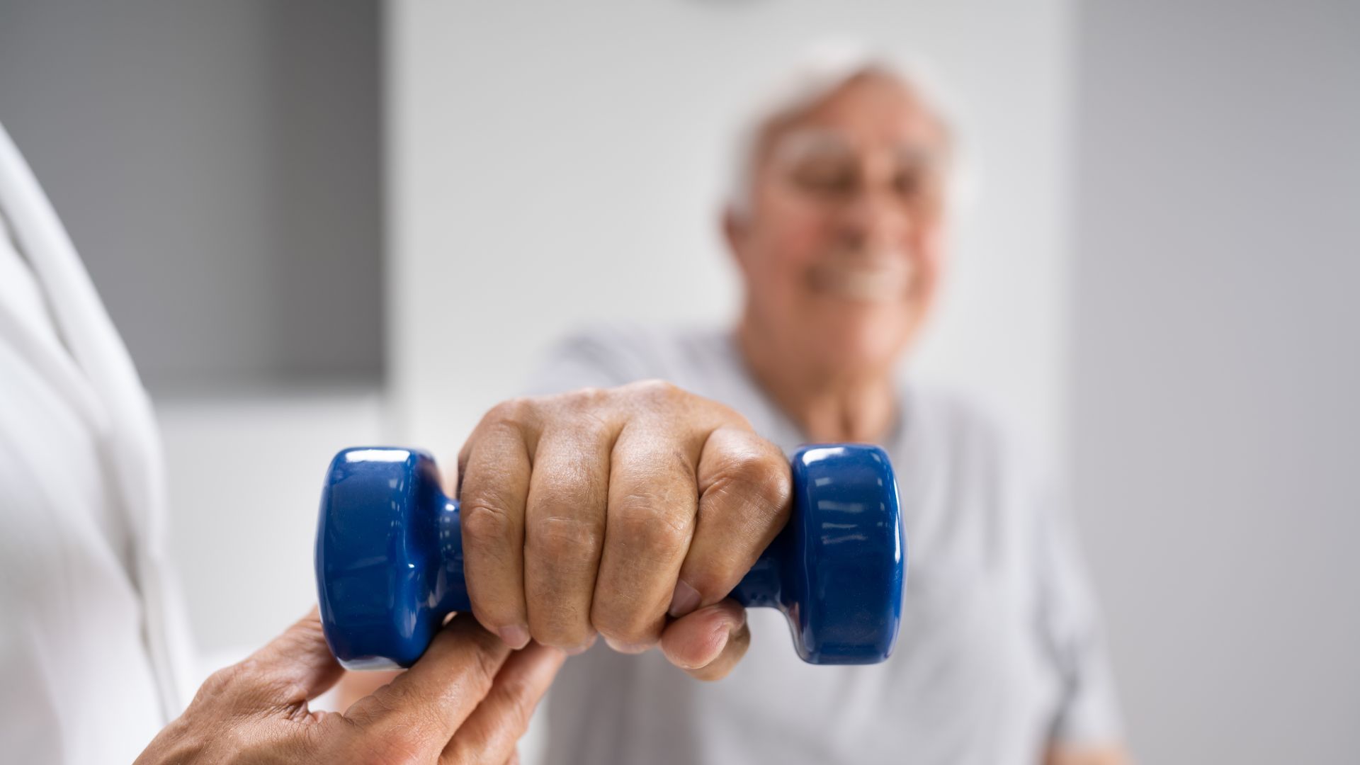 Man holding up a weight