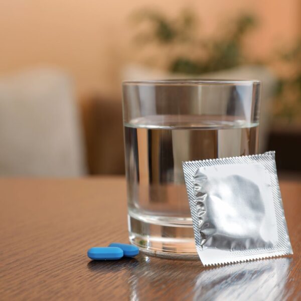 Pills next to water