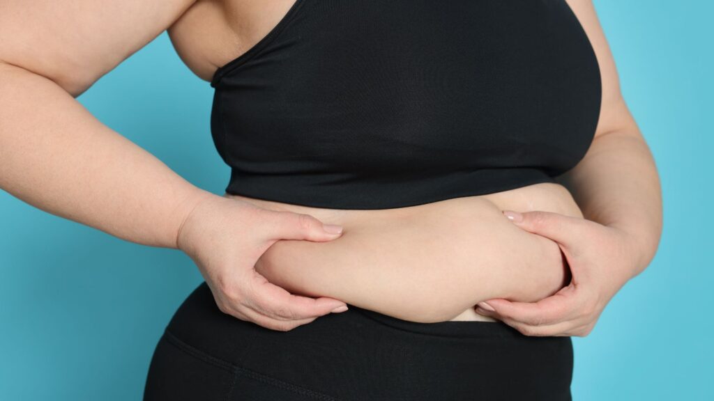 Person grabbing stomach