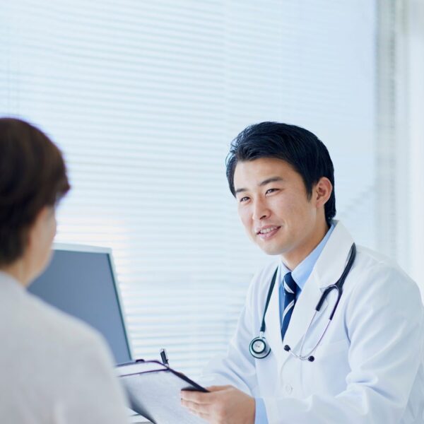 a doctor talking to a patient