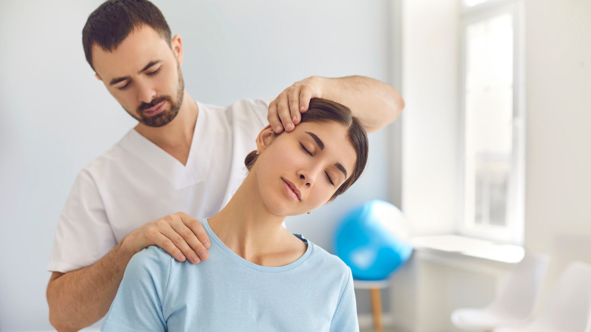 a person having their neck adjusted