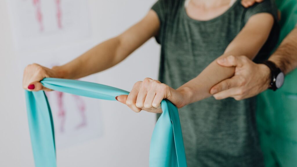 person using a resistance band for upper body